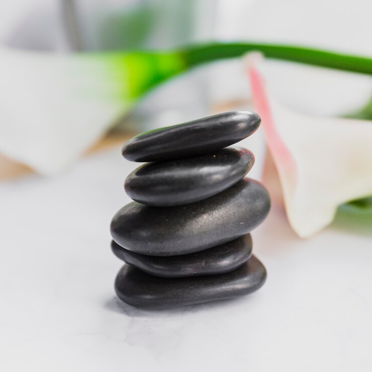 close-up-stack-pebbles_23-2147809265